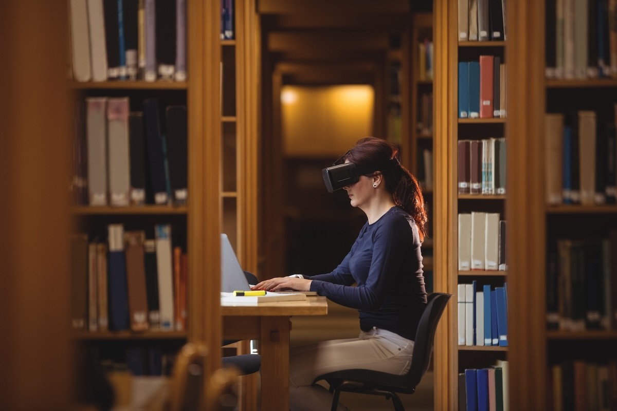 Woman working and learning with VR